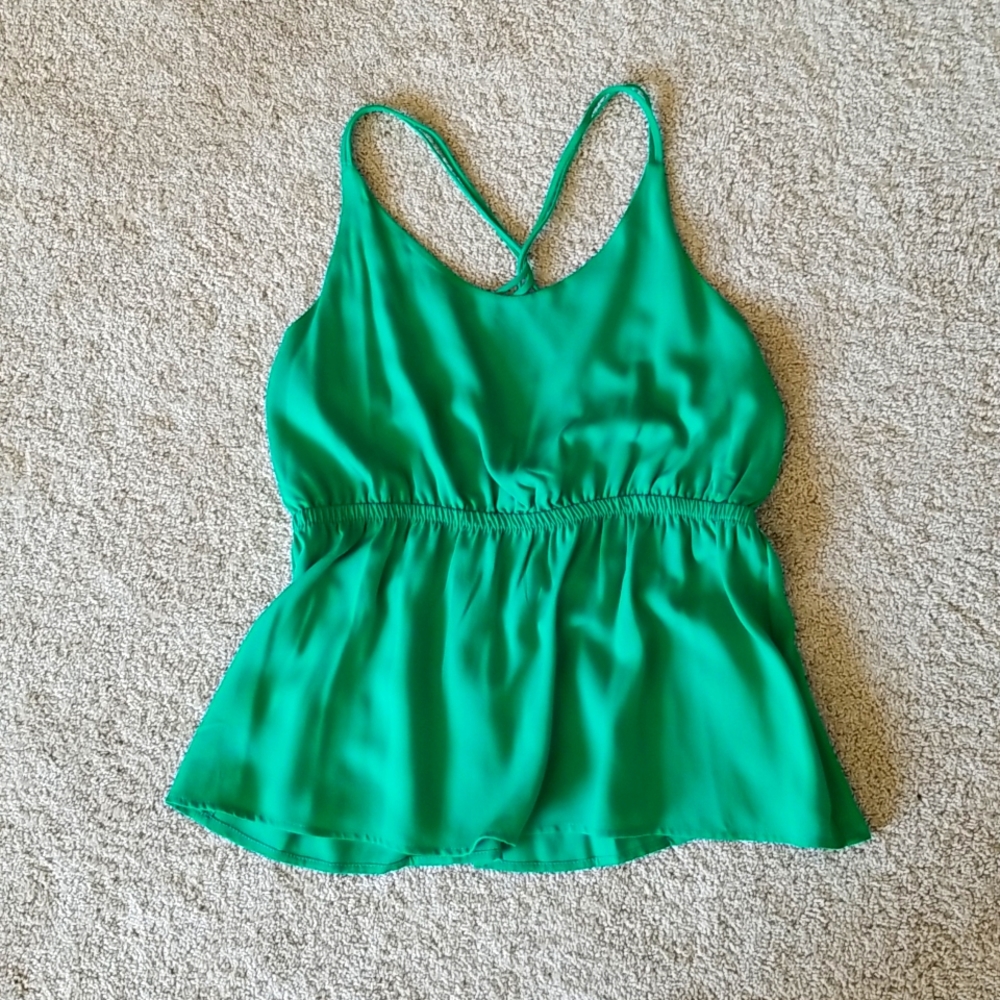 Green peplum tank